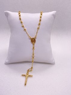 "14K 3MM Disco Bead Rosary -Solid 14K Yellow Gold -Beautiful beaded design -The length on this one is 18\" Inches + 4\" inches that dangles w/Cross -See reference pictures for measurements -Nice and sturdy Lobster Clasp -Great for daily wear or special occasions -Really nice gift for that special someone -Complete rosary necklace can be used to Pray (Message us if you have any other questions)" Gold Beaded Lariat Necklace With Dangle, Gold Beaded Dangle Lariat Necklace, Gold Spiritual Beaded Necklace With Dangling Beads, Spiritual Gold Beaded Necklaces With Dangling Beads, Spiritual Gold Beaded Necklace With Dangling Beads, Gold Spiritual Necklace With Dangling Beads, Spiritual Gold Necklace With Dangling Beads, Gold Lariat Necklace With Dangling Beads For Gifts, Gold Dangle Necklace With Polished Beads