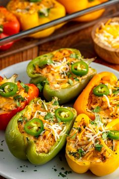 peppers stuffed with cheese and vegetables on a plate