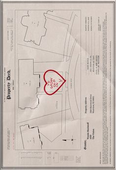 a map with a red marker on it and some buildings in the background that have been drawn out