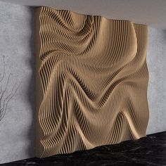 an abstract wall sculpture in the corner of a room