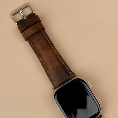 Enhance your Apple Watch experience with the Leathere Premium Leather Apple Watch Band. Designed with meticulous attention to detail, this strap combines timeless elegance with modern functionality, making it perfect for both casual and formal occasions.  Main Features:  Luxury Leather Sophisticated Design Secure Fit Compatible with All Apple Watch Models Adjustable Length Can be personalized %100 Leather Timeless Leather Strap Watch Accessories For Everyday Use, Timeless Watch With Bracelet Strap For Everyday, Classic Leather Strap Watch Bands For Everyday Use, Classic Watch Bands With Bracelet Strap For Everyday Use, Modern Brown Watch Band For Business, Leather Bracelet Strap For Watch, Everyday Wear, Leather Bracelet Strap For Everyday Watch Use, Adjustable Leather Watch Strap, Leather Bracelet Strap Watch Accessories For Everyday