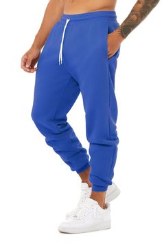 The Original Fleece Jogger – Farm Brand USA Blue Fleece Joggers For Loungewear, Solid Color Sports Sweats With Pockets, Winter Fleece Joggers In Athleisure Style, Fleece Sportswear Sweats With Side Pockets, Fleece Sweats With Side Pockets For Sportswear, Blue Fleece Sweatpants For Winter, Solid Color Sportswear Sweatpants With Drawstring, Winter Fleece Sweatpants Athleisure, Winter Leisure Joggers With Side Pockets