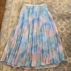 Beautiful Watercolor Pleated Long Skirt. Nyt. Never Been Worn, Mint Condition. Size Medium. I Am 5 Foot 6 And It Hits At The Top Of My Ankles. Lined. Really Beautiful Could Fit Other Sizes As Well. Elastic Waistband. I Am Negotiable On Price! The Brand Is "French" Except The N Is Backwards. Multicolor Pleated Bottoms For Spring, Cheap Blue Pleated Maxi Skirt, Spring Purple Pleated Maxi Skirt, Blue Pleated Chiffon Maxi Skirt, Relaxed Purple Pleated Maxi Skirt, Blue Gathered Midi-length Maxi Skirt, Pleated Long Skirt, Long Skirt, Summer Aesthetic