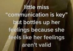 a man in a black jacket with a quote on his face that says, little miss communication is key but bottles up her feelings because she feels like her feelings