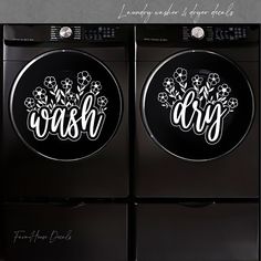 two black washers with white lettering and flowers on the front are shown in this image