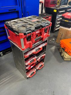 several tool boxes stacked on top of each other