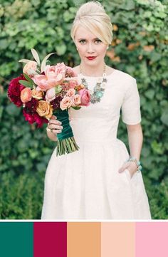 a woman in a white dress holding a bouquet of flowers