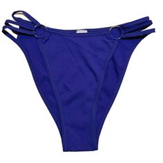 New High Cut Bikini Pantie. Material Is A Blue Ribbed Nylon Blend With Decorative Gold Rings. Blue High-cut Leg Bottoms For Beachwear, Blue High-cut Leg Bottoms For Beach, Vacation Blue Brief Bottoms, Blue Tie-side Swimming Bottoms, Black Seamless, Lace Print, Ring Color, Lace Thong, High Cut