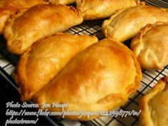 several baked pastries cooling on a rack