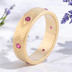 Vintage Karma Eya Ruby ERing Evil Eye Engraved Band is in 14K Solid Gold & Variants, Women Jewelry Gift for Her, Wide Minimalist Ring Main Stone - Ruby Stone Color - Pink Birthstone - July Stone Creation - Lab Created Cut of Stones -Round  Stone size - 3 MM Birthstone: July Rose gold plated,925 sterling silver Any ring size can be made. Metal can be upgraded to solid 14k or 18k gold. Gemstone can be replaced or upgraded. Ring setting can be made.  Beautiful Gift box included. For custom making j Gold Ruby Ring With Halo In 14k Gold, Gold Ruby Halo Ring In 14k, 14k Gold Ruby Ring With Halo Design, Spiritual Gold Birthstone Promise Ring, Gold Ruby Ring With Halo For Gift, Ruby Stone, Minimalist Ring, Ring Setting, July Birthstone