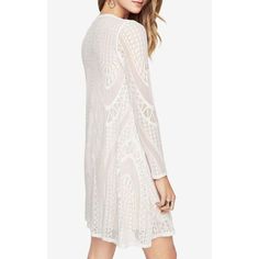 Our must-have long-sleeve dress in geometric lace falls for a semi-relaxed fit and has some stretch for all-day ease. Its semi-sheer effect is pared down with its jersey lining through the body.PulloverGeometric patchwork laceFabric: 95% nylon, 5% spandex lace; lining: 92% polyester, 8% spandex jerseyWashable, dry clean recommendedMid-weight, stretch fabricKnee-length hemlineTrue to fitModel is approximately 5'9” Long Sleeve Scalloped Lace Dress, Elegant Long Sleeve White Crochet Dress, Bohemian Fitted Long Sleeve Lace Dress, Fitted Bohemian Long Sleeve Lace Dress, Chic Lace Dress With Sheer Long Sleeves, Summer Scalloped Lace Long Sleeve Dress, Fitted Long Sleeve Bohemian Lace Dress, Summer Long Sleeve Lace Dress With Scalloped Lace, Summer Lace Dress With Scalloped Lace And Long Sleeves