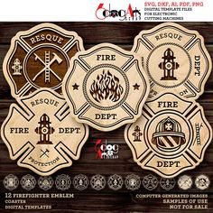 four fire department emblems on wooden background