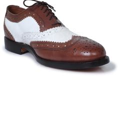 Looking for something that speaks classy? These dual toned oxford shoes should be the perfect fit for your taste. Manufactured using high- quality genuine leather; these pair of shoes carry a distinctive brogue wing-tip design perfect for flaunting at any formal event such as weddings or business gatherings. This product undoubtedly reflects its worth with the unique color contrast of rich coffee brown & white along with its specific finesse and detailed designing on the border of the shoes. The inner soles of the shoes are also lined with leather making for a comfortable, cozy fit throughout the day. Some features of the product that highlight its worth include: Use of premium leather Unique color combination of coffee and white Fashionable brogue wing-tip design Leather padding on the in White Wingtip Oxfords With Brogue Detailing, White Wingtip Oxfords For Office, Semi-formal White Oxfords With Brogue Detailing, White Brogue Oxfords For Semi-formal Occasions, White Oxfords With Brogue Detailing For Semi-formal Occasions, White Oxford Wingtip Dress Shoes, White Brogue-detailed Oxfords For Semi-formal Occasions, Retro Wingtip Brogue Lace-up Shoes, Retro Wingtip Lace-up Shoes With Brogue Detailing