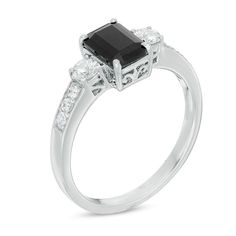 Bold and dramatic, this elegant fashion ring is just her style. Crafted in sleek sterling silver, this ring features a stunning 7.0 x 5.0mm emerald-cut black sapphire center stone. Smaller round white sapphires flank this eye-catching gem, while white sapphire accents line the ring's shank. A colorful contrast with a sophisticated design, this ring is finished with a bright polish. This ring is available in select sizes only. Sterling silver rings cannot be resized after purchase. Three Stone Ring, Black Sapphire, Just She, Fashion Ring, Three Stone Rings, Sophisticated Design, White Sapphire, Three Stone, Stone Ring