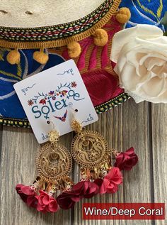 These Beautiful Mexican Earrings are made with the Mexican art form of twisting gold plated wires to create beautifully intricate works of art. The silk flowers add that feminine touch to any outfit! These earrings are handmade by Mexican Artisans. More colors available here: https://www.etsy.com/es/listing/887054053/aretes-mexicanos-de-filigrana-aretes?ref=listing_published_alert Gold Drop Flower Earrings For Festive Occasions, Gold Flower Earrings For Festive Occasions, Festival Dangle Flower Earrings As Gift, Festival Gift Dangle Flower Earrings, Elegant Dangle Flower Earrings For Festivals, Traditional Gold Flower Earrings With Ear Wire, Gold Flower Drop Earrings For Festival, Gold Flower Earrings For Festival, Elegant Gold Flower Earrings For Festivals