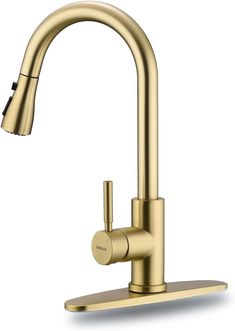 a brass colored faucet with the water running from it's spout