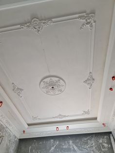 the ceiling is covered in white paint