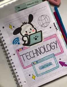 a notebook with the words technology on it and an image of a dog holding a laptop