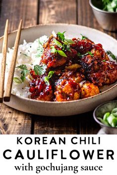 korean chilli cauliflower with gochujun sauce in a bowl on a wooden table