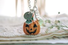 You can celebrate the Fall Season and Halloween all year long with this personalized Initial and birthstone Jack O Lantern Pumpkin.   Designed from high quality silver plated material, it will last a lifetime! The perfect keepsake gift for anyone celebrating their birthday in October. Select your necklace Initial, and birthstone from the drop-down menu when checking out. Add your choice of necklace length in the Personalization comment box. ✦Enjoy one FREE polishing cloth with your order Designe Halloween Themed Personalized Jewelry, Personalized Themed Jewelry For Halloween, Themed Personalized Jewelry For Halloween, Personalized Halloween Jewelry Gift, Halloween Novelty Personalized Jewelry, Personalized Silver Necklace For Halloween, Orange Jack O Lantern, Pumpkin Jewelry, Jack O Lantern Pumpkin