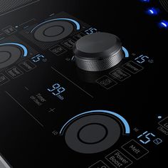 a close up view of the knobs and controls on an electric cooktop with blue lights