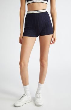 Look sleek in workout mode wearing these sporty bike shorts cut in a high-waisted silhouette and stamped with logo branding. Pull-on style 70% viscose, 30% polyester Dry clean or machine wash, dry flat Imported Asian & Pacific Islander Owned/Founded Sporty Fitted Biker Shorts For Loungewear, Sporty Mid-thigh Loungewear Shorts, Fitted Athleisure Biker Shorts For Loungewear, Sporty Biker Shorts With Ribbed Waistband, Athleisure High-waisted Biker Shorts For Loungewear, Sporty Shorts With Ribbed Waistband, Stretch Biker Shorts With Ribbed Waistband, High Waist Elastane Athleisure Shorts, Sporty Above Knee Shorts For Loungewear