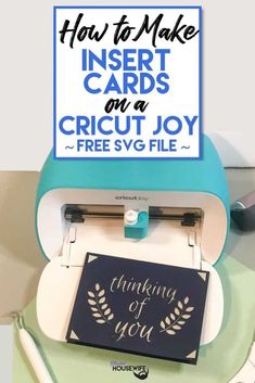 a blue and white machine with a sign above it that says how to make insert cards on a cricut joy free svg file