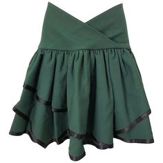 Rare late 1960s CARDINALI hunter / forest green lightweight wool handkerchief hem mini skirt! This beauty comes straight from Marilyn Lewis' estate (the designer and founder of Cardinali). The perfect green hue with black silk trimming each hem. Unique and flattering tulip dipped hem. Can easily be dressed up or down. In good condition. Made in Italy Approximately Size Medium Measurements: 28-30 inch waist (sits lower on the waist) 44 inch hips Retro Green Skirt For Fall, Fitted Green Mini Skirt For Evening, Green Vintage Mini Skirt, Vintage Green Mini Skirt, 60s Mini Skirt, Handkerchief Skirt, Late 1960s, Handkerchief Hem, Green Wool