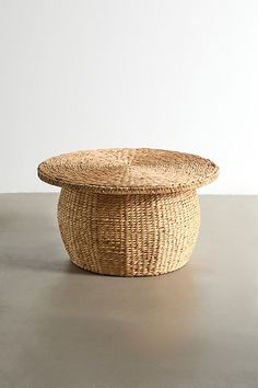 a wicker basket sitting on top of a table