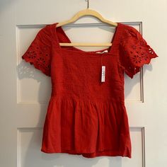 Nwt Madewell Red Eyelet-Sleeve Lucie Smocked Peplum Blouse Size Xxs New With Tags Name Written On Inside Tag (Not Visible When Worn) Buttoned Down The Back, This Smocked Top Is Fitted Through The Bodice With A Flowy Peplum Waist. So Pretty (Hello, Eyelet Embroidered Sleeves) Yet Totally Comfy. Regular Fit. Cotton. Spring Peasant Top With Smocked Bodice And Short Sleeves, Fitted Smocked Top With Short Sleeves, Cotton Short Sleeve Tops With Smocked Back, Cotton Tops With Smocked Back And Short Sleeves, Short Sleeve Blouse With Smocked Bodice For Day Out, Summer Short Sleeve Smocked Top, Chic Red Smocked Top For Summer, Short Sleeve Blouse With Smocked Back For Day Out, Summer Peasant Top With Smocked Back And Short Sleeves