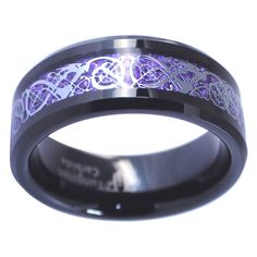 a wedding ring with purple and black inlays