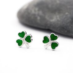 Beautiful sterling silver shamrock necklace and earring set. Each leaf is set with striking green enamel to create a great pop of color. The shamrock is our national emblem and is considered to be a Good Luck charm. Perfect for wearing on St Patrick's day on March 17th, our national festive holiday.Pendant measures 20mm (approx 0.79 inches) including bail. Shamrock Jewelry, Shamrock Necklace, Diamond Claddagh Ring, Mens Claddagh Ring, Claddagh Ring Wedding, Engagement Ring Necklace, Silver Shamrock, Shamrock Earrings, Celtic Engagement Rings