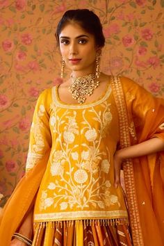 Yam golden yellow mustard padded bodice tunic with all over floral vine brocade pattern. Paired with dual tone, attached cancan lehenga with brocade panels and dupatta. - Aza Fashions Bollywood Wedding Palazzo Set With Motifs, Floor-length Motif Dupatta, Straight Kurta Wedding Dress With Motifs, Wedding Straight Kurta Dress With Motifs, Chanderi Dress With Motifs For Wedding, Chanderi Wedding Dress With Motifs, Wedding Palazzo Set With Straight Kurta And Motifs, Fitted Salwar Kameez With Motifs For Wedding, Fitted Palazzo Set With Motifs For Diwali