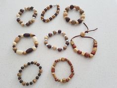 These are hand made stretch bracelet with wooden beads. I made them with different style and used different styles beads. I can make them as request of size and patteren require. Cheap Wooden Beaded Bracelets, Handmade Wooden Beaded Bracelets, Casual Brown Wooden Bead Bracelets, Beads Jewelry Ideas, Wooden Beads Jewelry, Bracelets Beach, Wooden Bead Jewelry, Bracelets Men, Men Bracelets