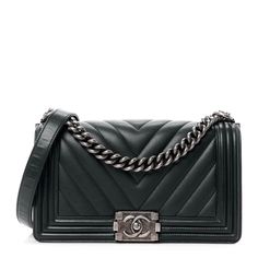 This is an authentic CHANEL Lambskin Chevron Quilted Medium Boy Flap in Black. This stylish shoulder bag is crafted of luxurious chevron quilted caviar leather in black with linear quilted border. The bag features a ruthenium chain-link shoulder strap with a leather shoulder pad, and a ruthenium boy CC push lock on the front. This opens the bag to a gray fabric interior with a patch pocket. Chanel Boy Bag Black, Cc Card, Chanel Print, Chanel Crossbody, Chanel Tweed, Border Frame, Medium Sized Bags, Chanel Shoulder Bag, Chevron Quilt