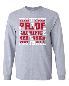 A tradition of excellence built the foundation for ongoing success. FREE SHIPPING on all orders over $35 Officially licensed by the University of Nebraska 90% cotton, 10% polyester, preshrunk jersey tee, 6.0 oz. Seamless double-needle collar Printed in Lincoln, Nebraska Football Spirit Shirts High School, School Pride Shirts Design, School Tee Shirt Designs, School Pride Shirts, College Football Shirts, High School Sports Shirts, School Sports Shirts, Football Spirit Shirts, High School Football Shirts