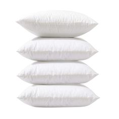 four pillows stacked on top of each other