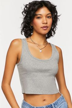 Seamless Crop Top Tank For Layering, Trendy Cropped Tank Top For Layering, Casual Tank Straps Crop Top For Everyday, Casual Tank Strap Crop Top For Everyday, Casual Everyday Crop Top With Tank Straps, Basic Cropped Ribbed Tank Top, Ribbed Tank Strap Crop Top, Everyday Cotton Scoop Neck Crop Top, Ribbed Tank Straps Crop Top For Everyday