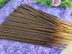 the sticks are lined up and ready to be used as incenses for making candles