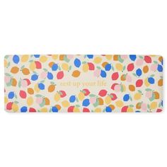 a card with colorful polka dots and the words, less up your life on it