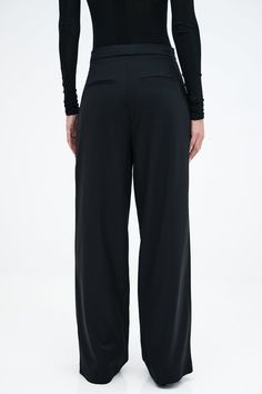 Handcrafted to last, designed for you to love—our Morrison Pants are your next signature cut. She’s fashioned from breathable European polyviscose and tailored to flatter with a wide-leg, high-waist silhouette. Featuring an angled button and hook closure that blends seamlessly into her pleats for unique visual movement, her style is ultra-wearable so you can drift easily from day to night.[SPLIT] Sam, in black, is 5'8" (173 cm) tall, wearing size XS. Astrid, in off white, is 5'9" (175 cm) tall, Tailored Wide-leg Pants For Business Casual, Relaxed Fit Full-length Elastane Pants, Tailored Versatile Wide Leg Pants, Versatile High-waisted Viscose Pants, Elegant High-waisted Viscose Pants, Tailored Wide-leg Dress Pants, Versatile Tailored Wide Leg Dress Pants, Viscose Wide-leg Pants With Elastic Waistband, Loosely Fitted Viscose Wide Leg Pants