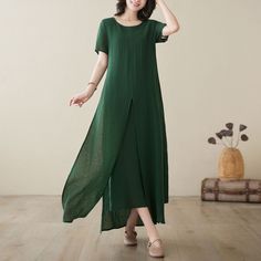 "The design of this dress is very unique, the double-layer design is more layered, the loose fit makes what kind of body can handle, and the green color is also very mysterious! Fall head over heels for the unique layered hem and adjustable fit. It's love at first wear.  FEATURES - 50% Linen, 50% cotton - Two layer, same fabric  - Short sleeve dress - Two side pockets - Round Neckline - Split hem dress - Button detail back neck line - Loose fit dress - Oversized dress - Asymmetrical dress - For Summer, spring - Dry clean Other color linen dress, maybe you will like it. https://etsy.me/3vkFgvx ★★Mode size Height 170cm (5′ 7″) Bust 84 cm (33\") Waist 66 cm (26\") She wears size XS ★★ Please select custom order according to the follow situation Your height is over 175cm Your weight is over 75 Maxi Linen Dress, Green Linen Dress, Women Casual Dress, Linen Dress Summer, Short Sleeve Maxi Dress, Split Hem Dress, Dress Asymmetrical, Short Sleeve Maxi Dresses, Loose Fitting Dresses