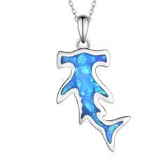 a blue fire opal pendant on a silver plated chain with a white background