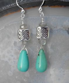 Basic, simple and pretty is how I would describe these lovely turquoise dangle earrings.  They will end up being your favorite 'go-to' earrings.   Perfect for all seasons, with a genuine Southwestern look for casual or fancy outings. tear drop shaped turquoise bead, sterling silver dangles and ear wires and two small labradorite beads to add a bit of shine when the sun touches them.  Earrings measure 2" from top of sterling silver ear wire to bottom of turquoise bead. Turquoise is a known as a h Everyday Turquoise Earrings For Pierced Ears, Everyday Turquoise Pierced Earrings, Hypoallergenic Turquoise Drop Earrings, Hypoallergenic Turquoise Earrings For Everyday, Everyday Turquoise Hypoallergenic Earrings, Earring Ideas, Jewelry Stone, Labradorite Beads, Homemade Jewelry