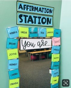 an affirmation station is decorated with sticky notes