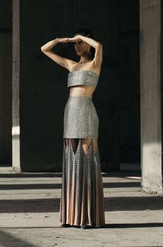 Handwoven and hand-embroidered silk-raffia skirt with gradient-dyed triangular chiffon fall panels, finished with fringes.Fabrics - Silk Raffia Mesh (35% Raffia, 35% Silk 30% Cotton Textured Yarns) + Metallic Underlay (100% Polyester) + Chiffon Fall Panels (100% Viscose) + Satin Lining (100% Viscose)EXTRA SMALL: 32 inches (bust), 25 inches (waist), 34 inches (hips).SMALL: 34 inches (bust), 27 inches (waist), 36 inches (hips).MEDIUM: 36 inches (bust), 29 inches (waist), 38 inches (hips).LARGE: 38 Hand Embroidered Skirt, Cape For Women, Multicolor Skirt, Strapless Bustier, Column Skirt, Paneled Skirt, Metallic Skirt, Lakme Fashion Week, Embroidered Skirt