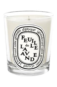 a candle that is sitting in front of a white background with the words ful de lave avend on it