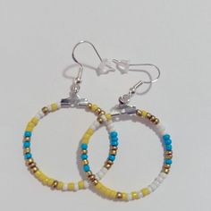 Handmade Silver Bead Hoop Earrings 925 Sterling Silver Earring Hooks Lightweight Color: Yellow/White/Gold/Turquoise Clear Backs Included Bead Hoop Earrings, Beaded Hoop Earrings, Beaded Hoops, Silver Bead, Earring Hooks, Handmade Beads, Silver Earring, 925 Sterling Silver Earrings, Silver Beads