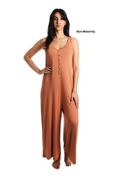 Sewn from an ultrasoft knit jersey in a wide-leg silhouette, this cozy sleeveless romper features a convenient button placket for easy nursing access. Scoop neck Sleeveless 95% rayon, 5% spandex Machine wash, tumble dry Imported Versatile Sleeveless Jumpsuits And Rompers For Loungewear, Comfortable Sleeveless Jumpsuits For Loungewear, Relaxed Fit Sleeveless Jumpsuits For Loungewear, Comfortable Sleeveless Jumpsuits And Rompers For Lounging, Comfortable Sleeveless Lounging Jumpsuit, Sleeveless Jumpsuits And Rompers For Lounging, Comfortable Sleeveless Jumpsuit For Lounging, Comfortable Sleeveless Loungewear Jumpsuit, Solid Sleeveless Jumpsuit For Lounging