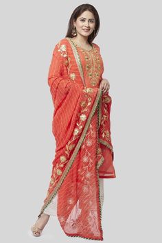 Show off your elegant style with this Set from Riafashions. Coral...the warm glow of this color compliments the radiant you for festive season. Set Features: Kurta Fabric: Chanderi Pants - Chanderi Cotton Dupatta: Net Dupatta Work: Gotta and Hot Pink Work Perfect to pick for Party, Wedding, Festival. Free Stitching & Shipping in the USA Leheriya Dupatta, Silk Kurti, Peachy Orange, Yellow Pants, Cotton Dupatta, Beautiful Suit, Net Dupatta, Silk Pants, Lavender Color